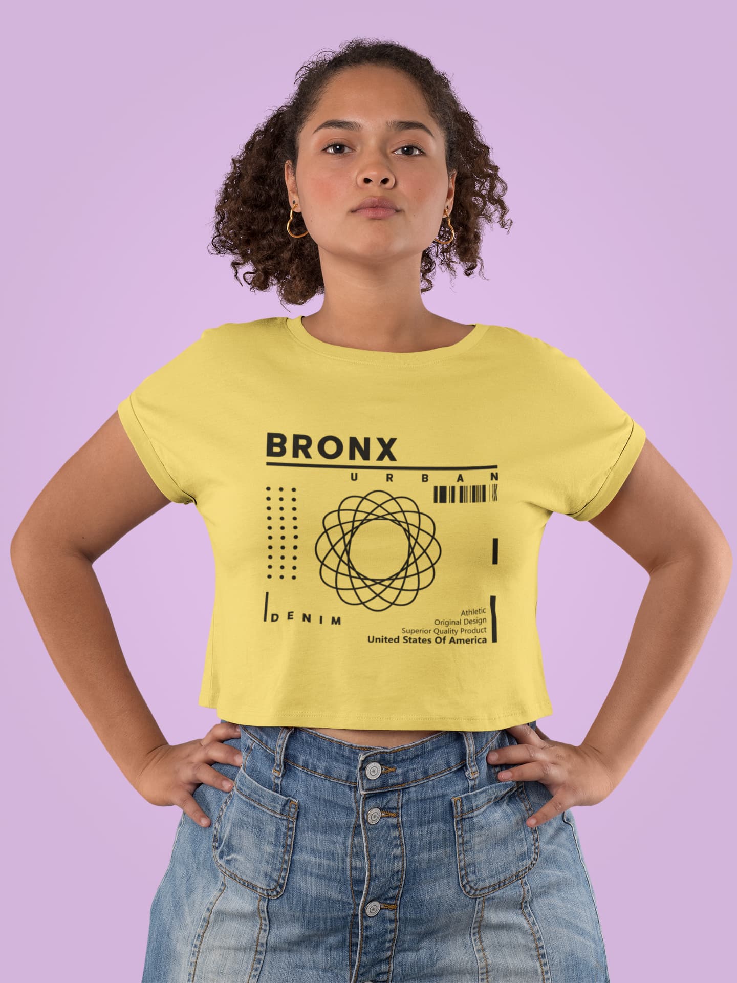 Person wearing a yellow t-shirt with &