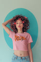 Woman wearing a pink &