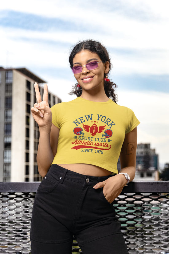Woman wearing a yellow t-shirt with &