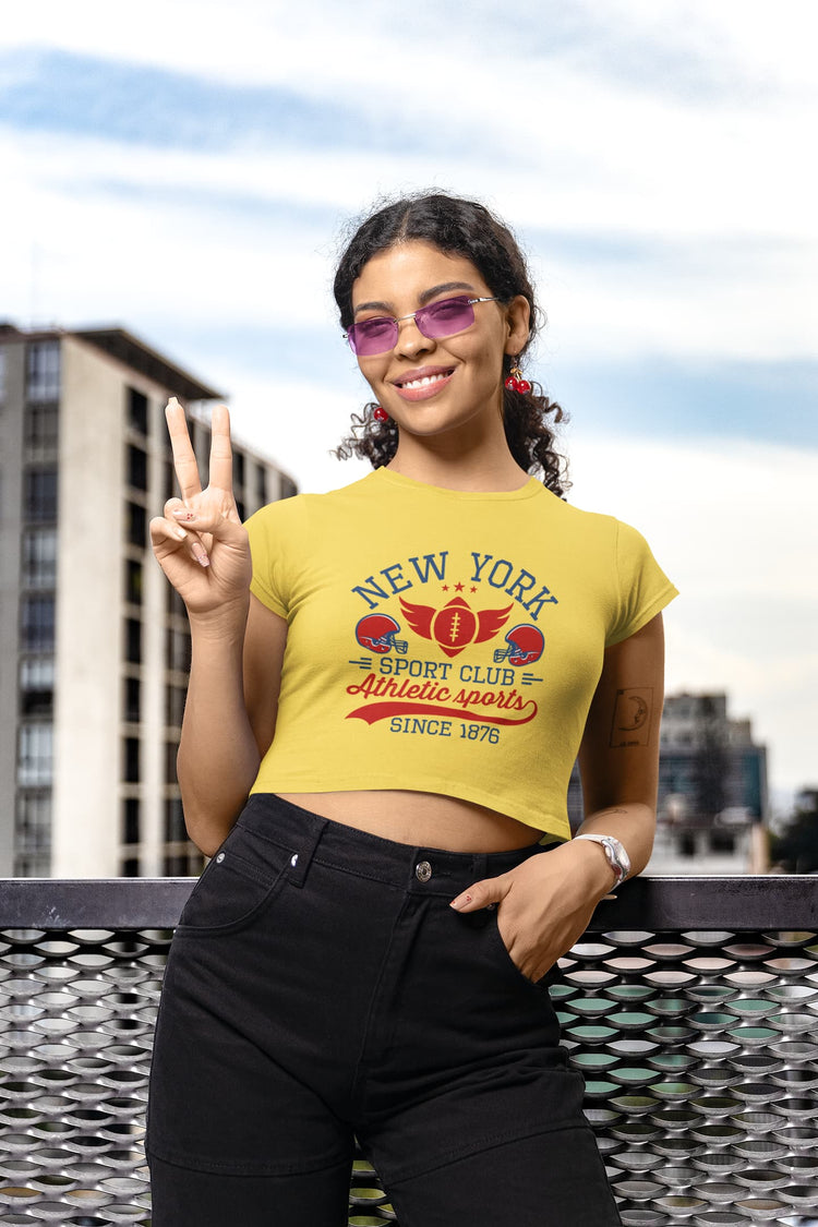 Woman wearing a yellow t-shirt with &