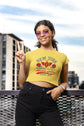 Woman wearing a yellow t-shirt with &