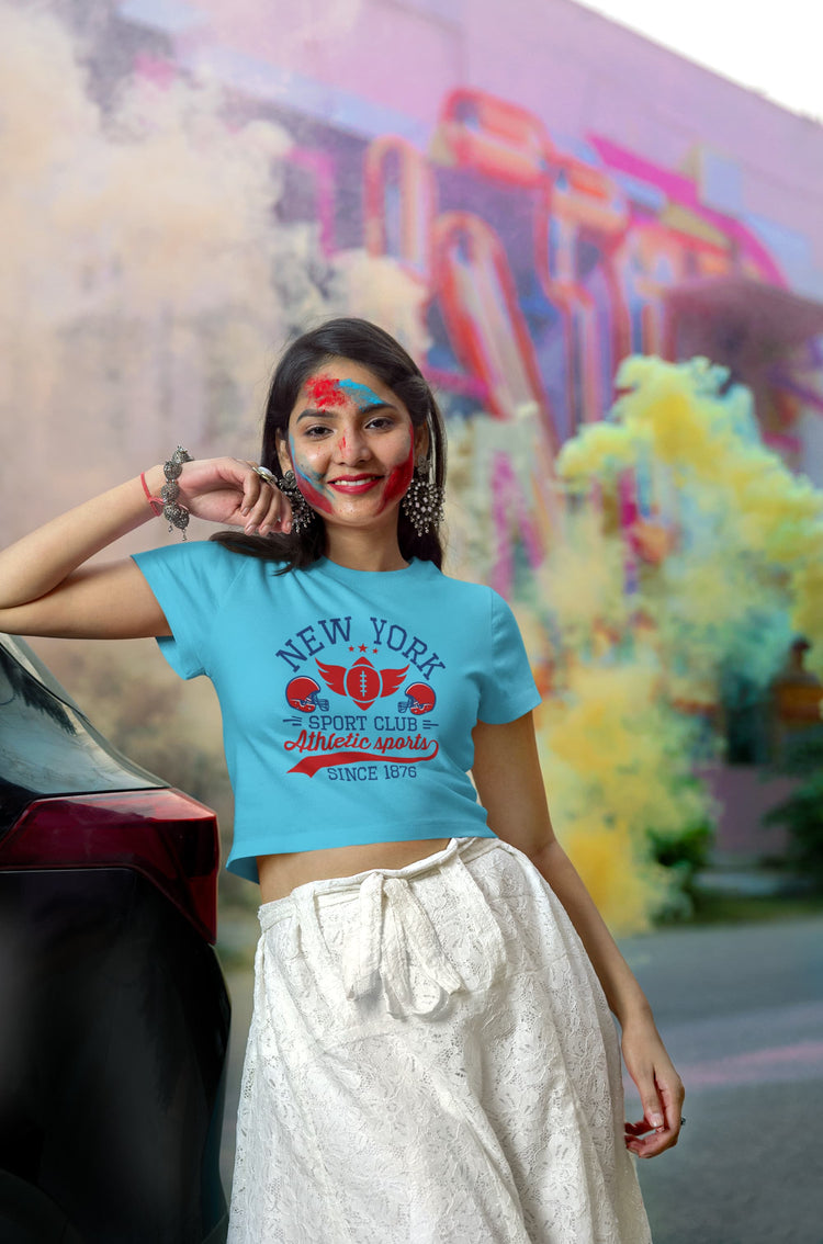 Woman wearing a blue t-shirt with &