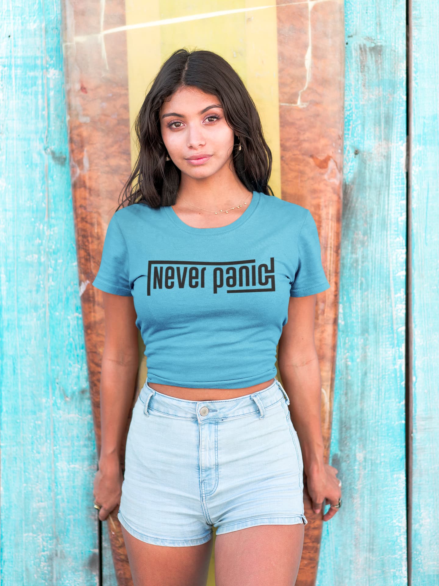 Woman wearing a blue t-shirt with &