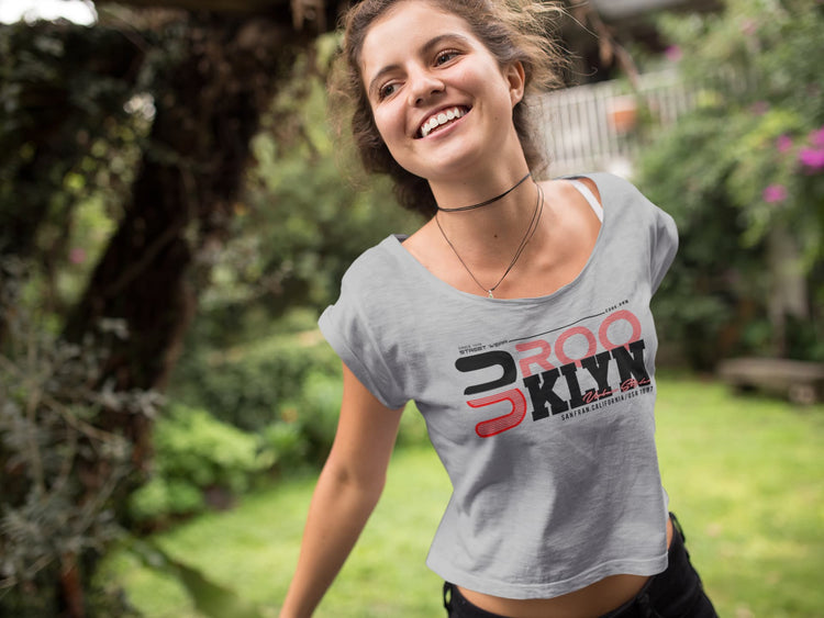 Woman wearing a gray t-shirt with &