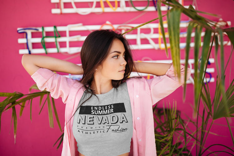 Woman wearing a gray t-shirt with &