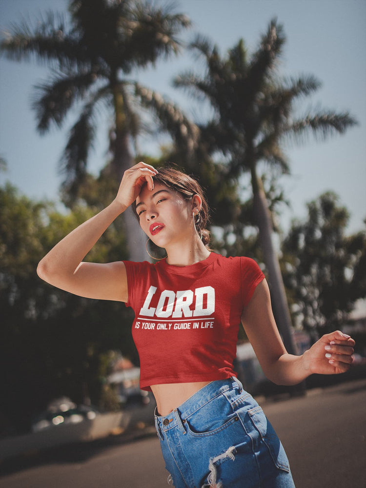 Woman wearing a red crop top with &