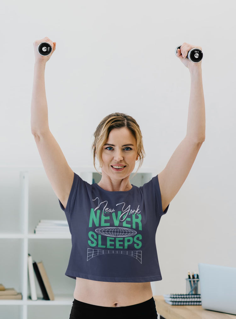 Woman exercising with dumbbells wearing a t-shirt with &