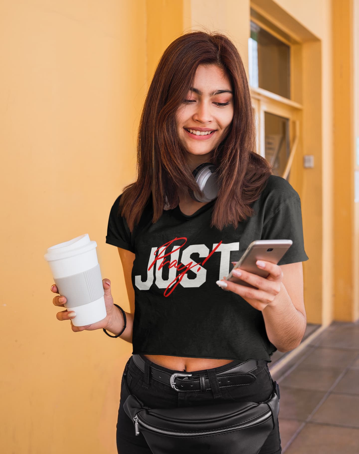 Woman wearing a black t-shirt with &