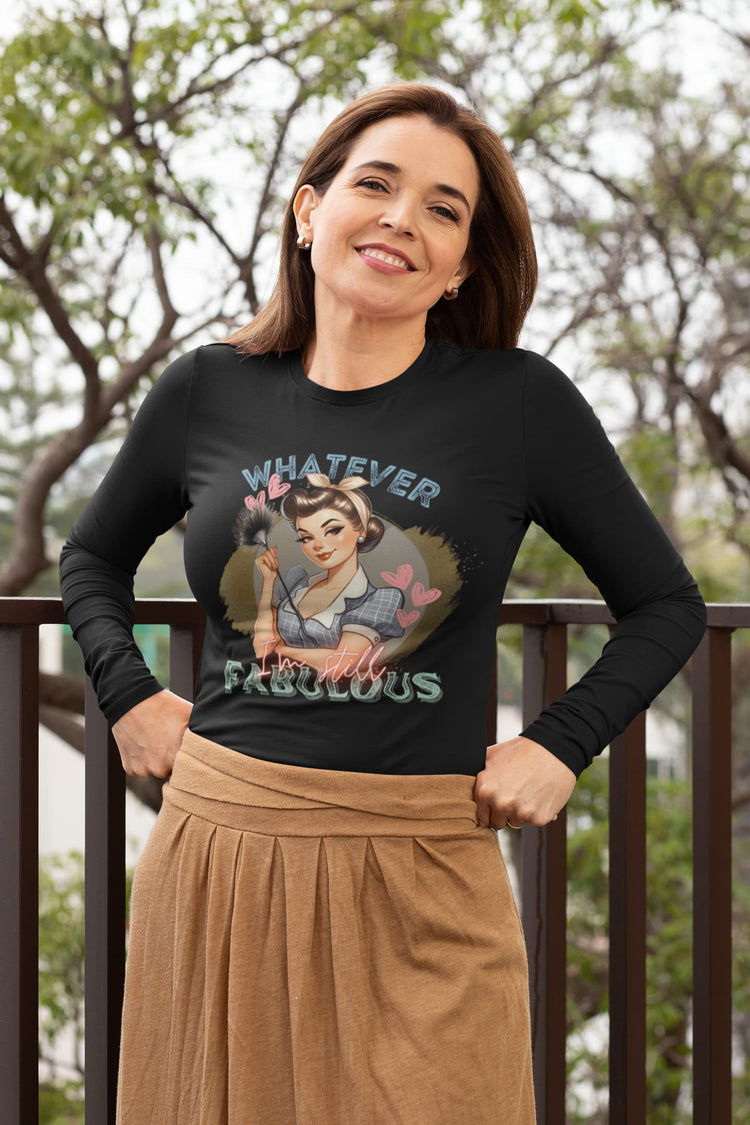Woman wearing a black long-sleeve shirt with a graphic design outdoors.