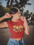 Woman wearing a red t-shirt with &