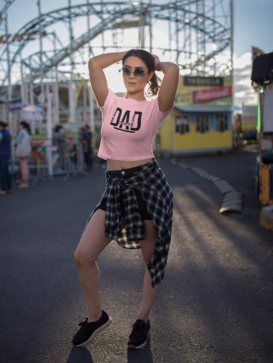 Woman in pink crop top with &