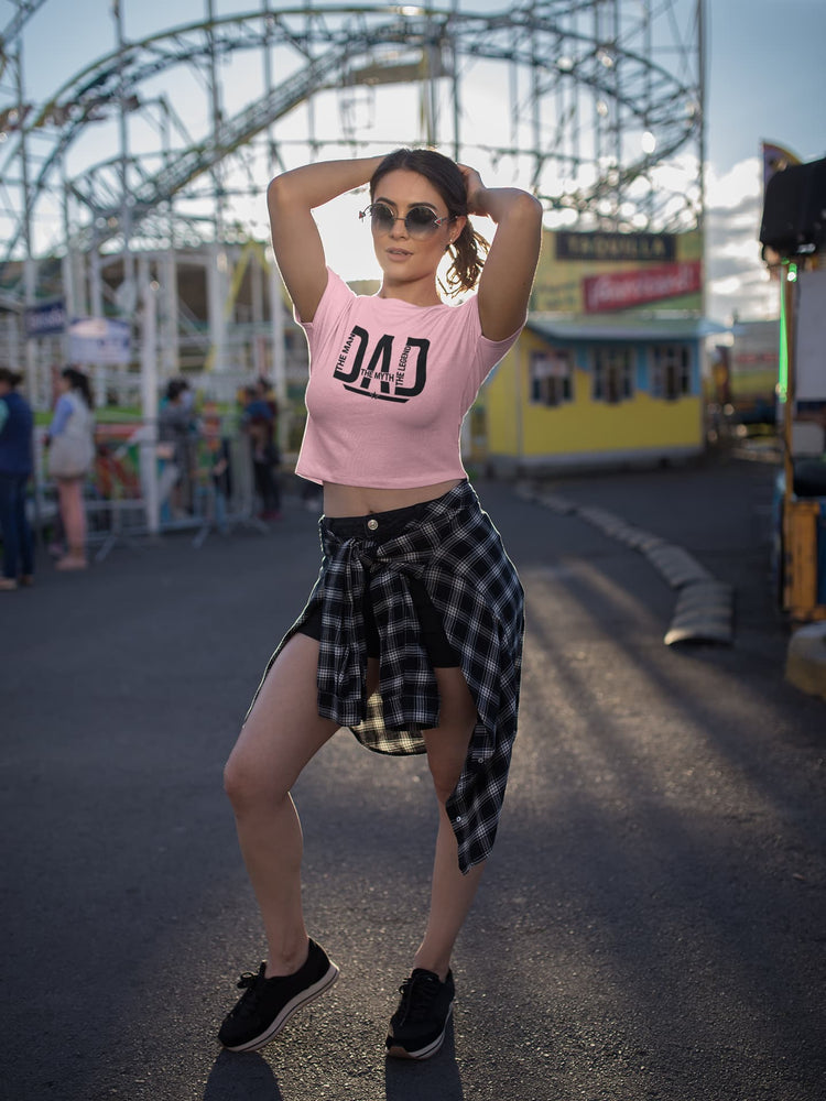 Woman in pink crop top with &
