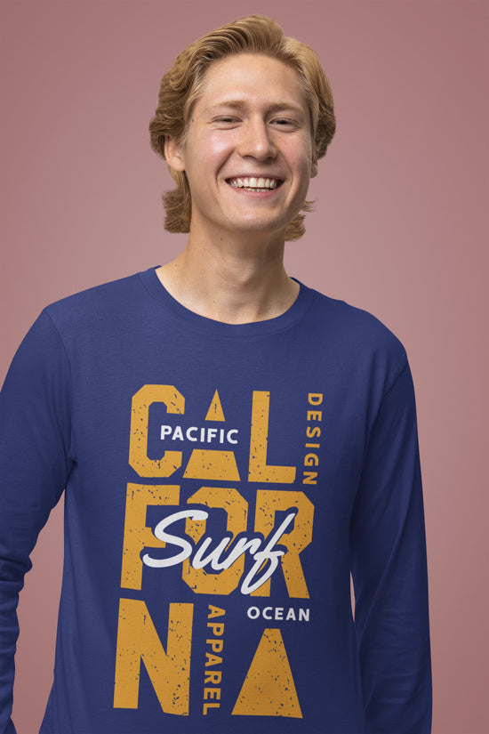 Person wearing a blue long-sleeve shirt with &