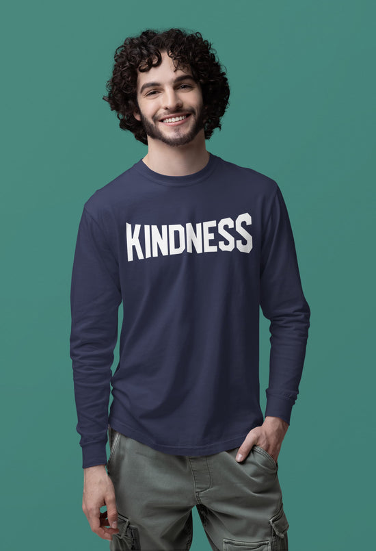 Man wearing a navy blue long-sleeve shirt with &