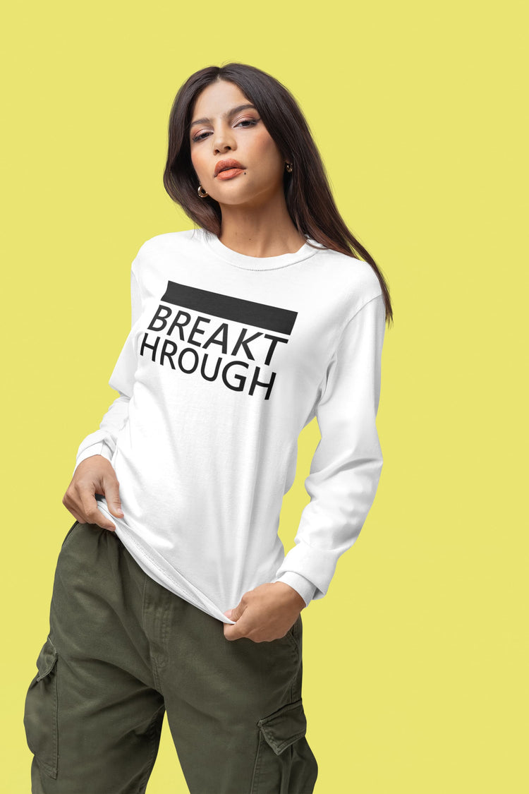 Woman wearing a white long-sleeve shirt with &