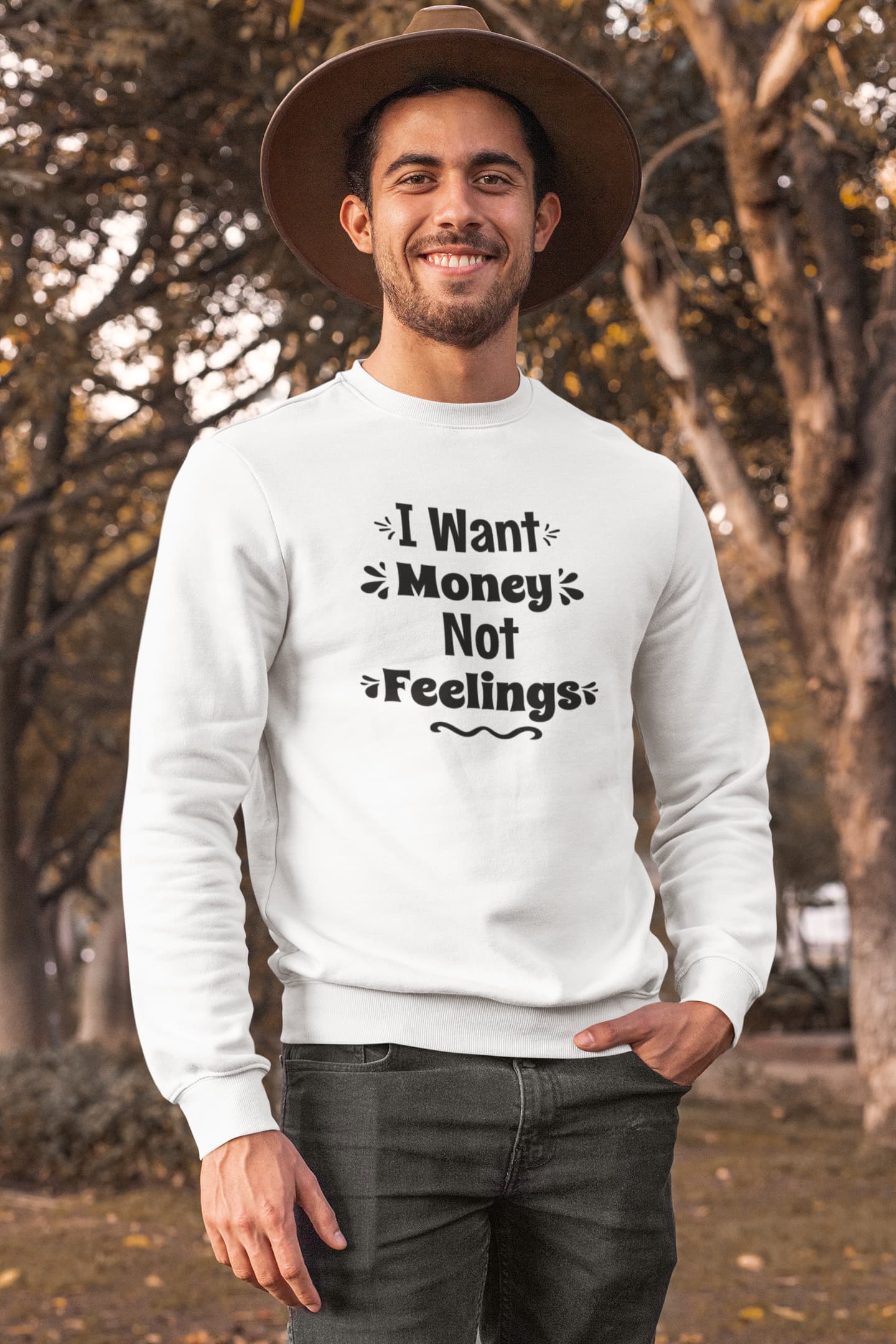 Man wearing a white sweatshirt with text outdoors