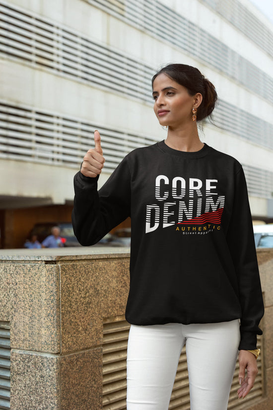 Woman wearing a black sweatshirt with &