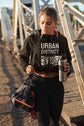 Woman in black athletic wear with &