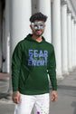 Man wearing a green hoodie with &
