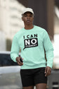 Person wearing a light green sweatshirt with &