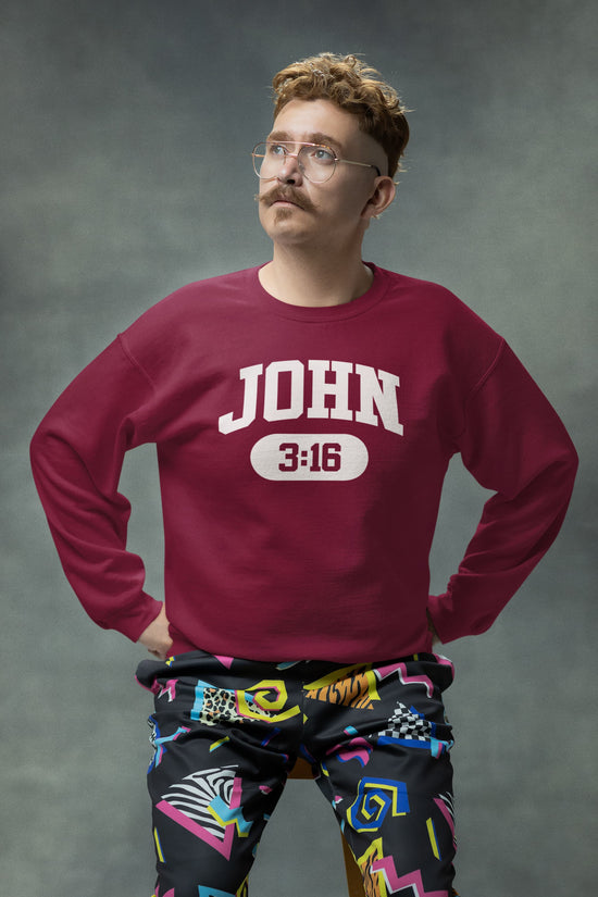 Person wearing a maroon sweatshirt with &