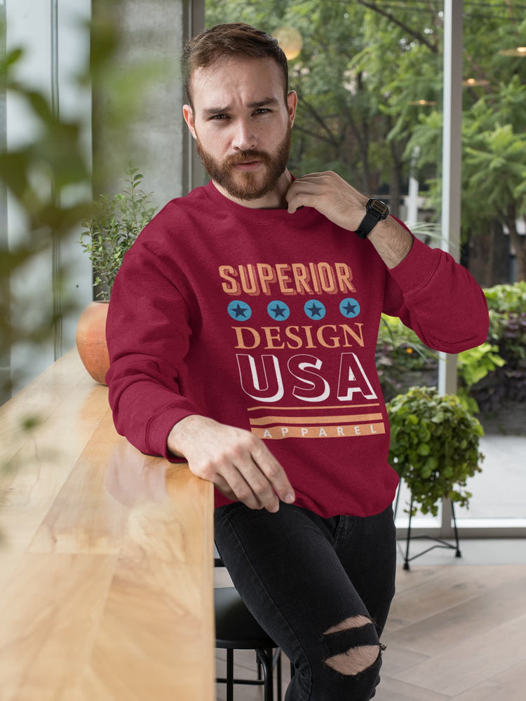 Man wearing a red sweatshirt with &