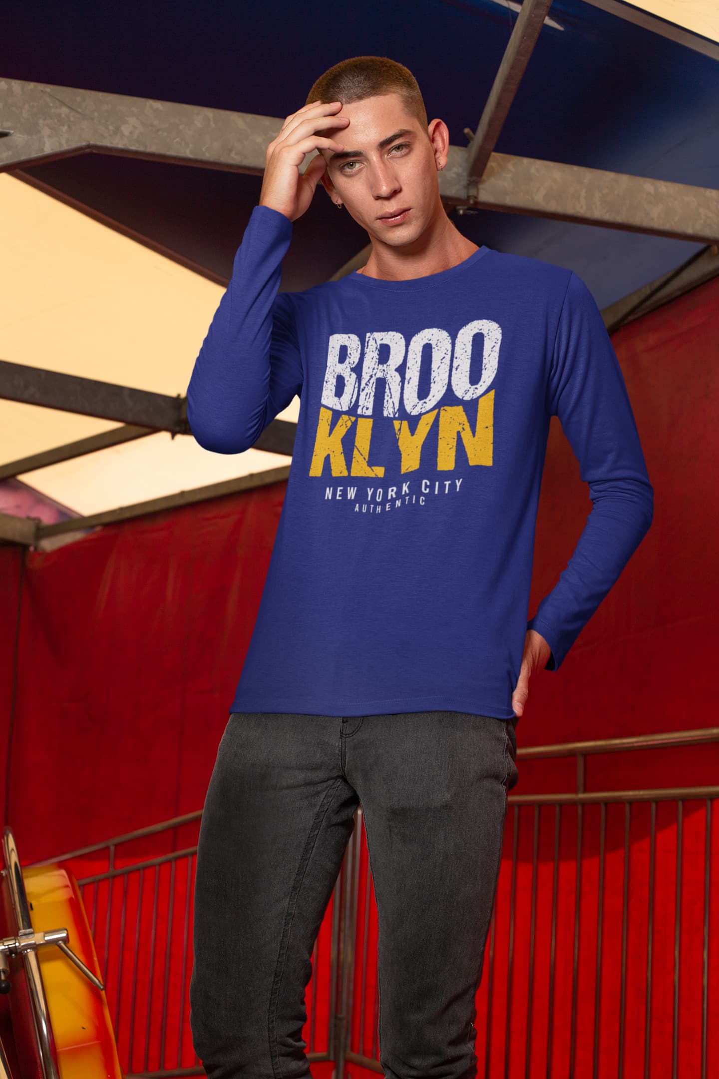 Person wearing a blue long-sleeve shirt with &