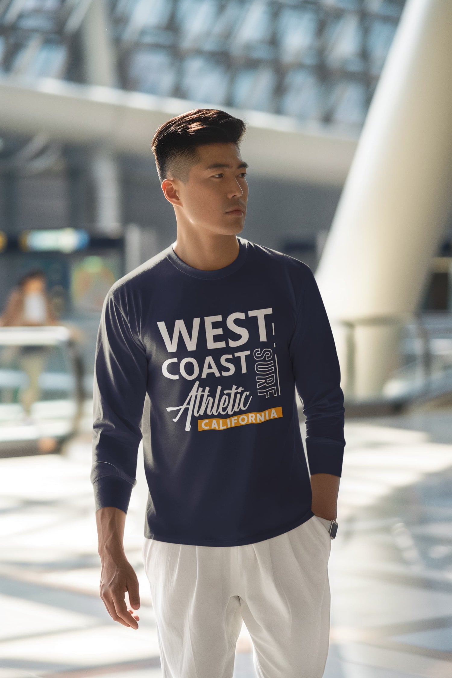 Man wearing a navy blue sweatshirt with &