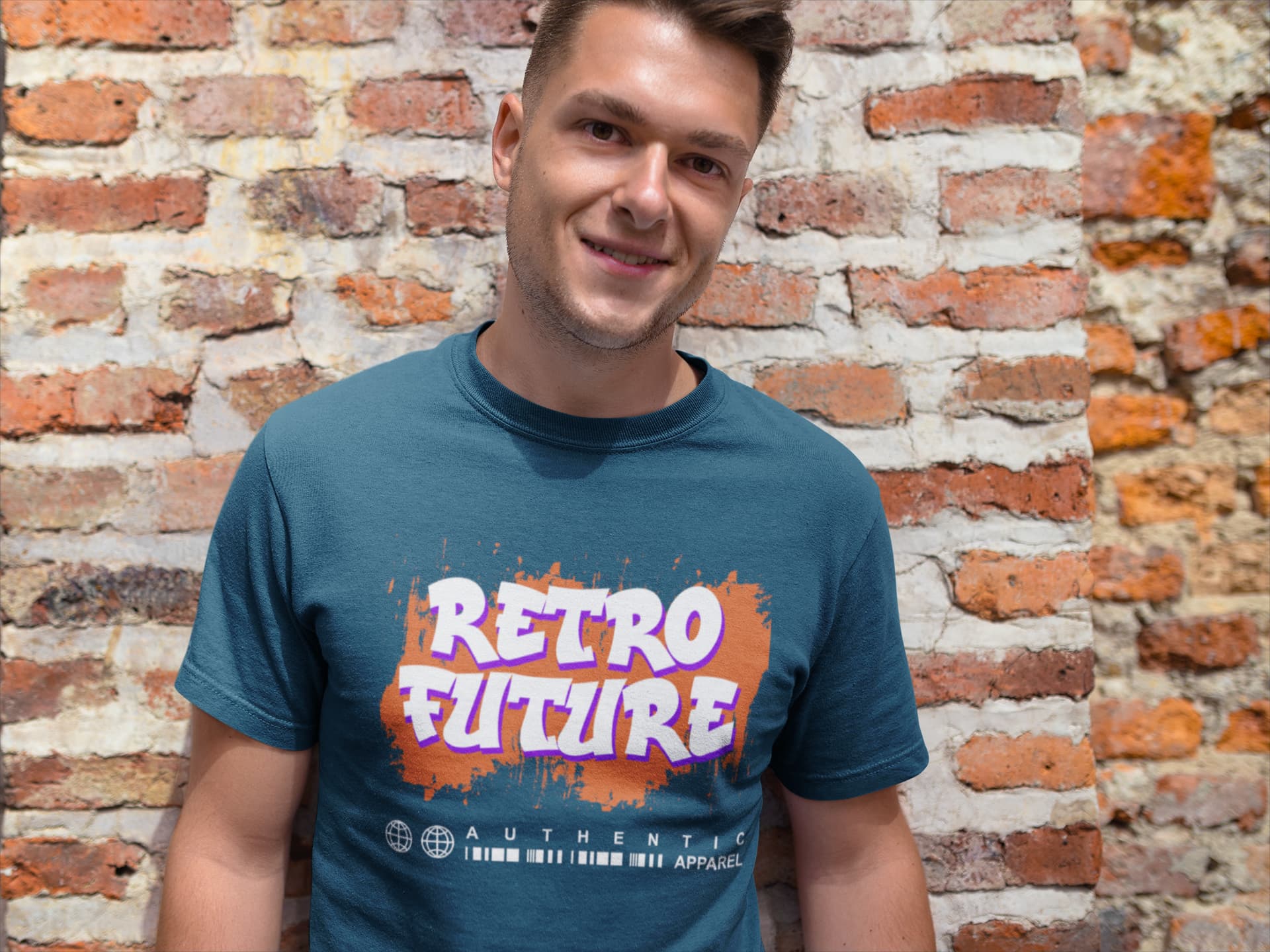 Man wearing a blue t-shirt with 'Retro Future' design against a brick wall.