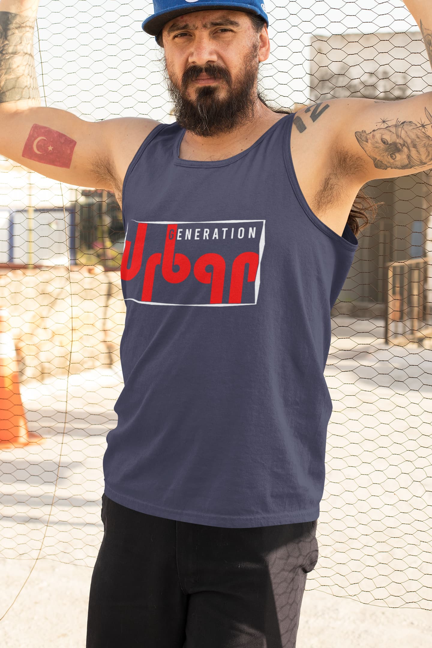 Man wearing a navy tank top with &