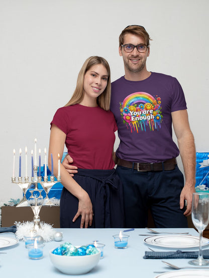 Man and woman standing together with a table set for a meal in the background