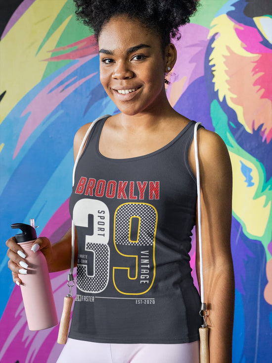 Woman wearing a tank top with &