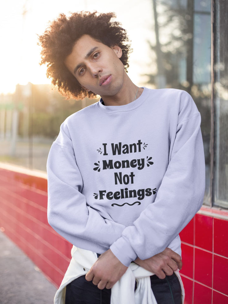 Person wearing a light gray sweatshirt with text outdoors.