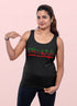 Woman wearing a black tank top with &