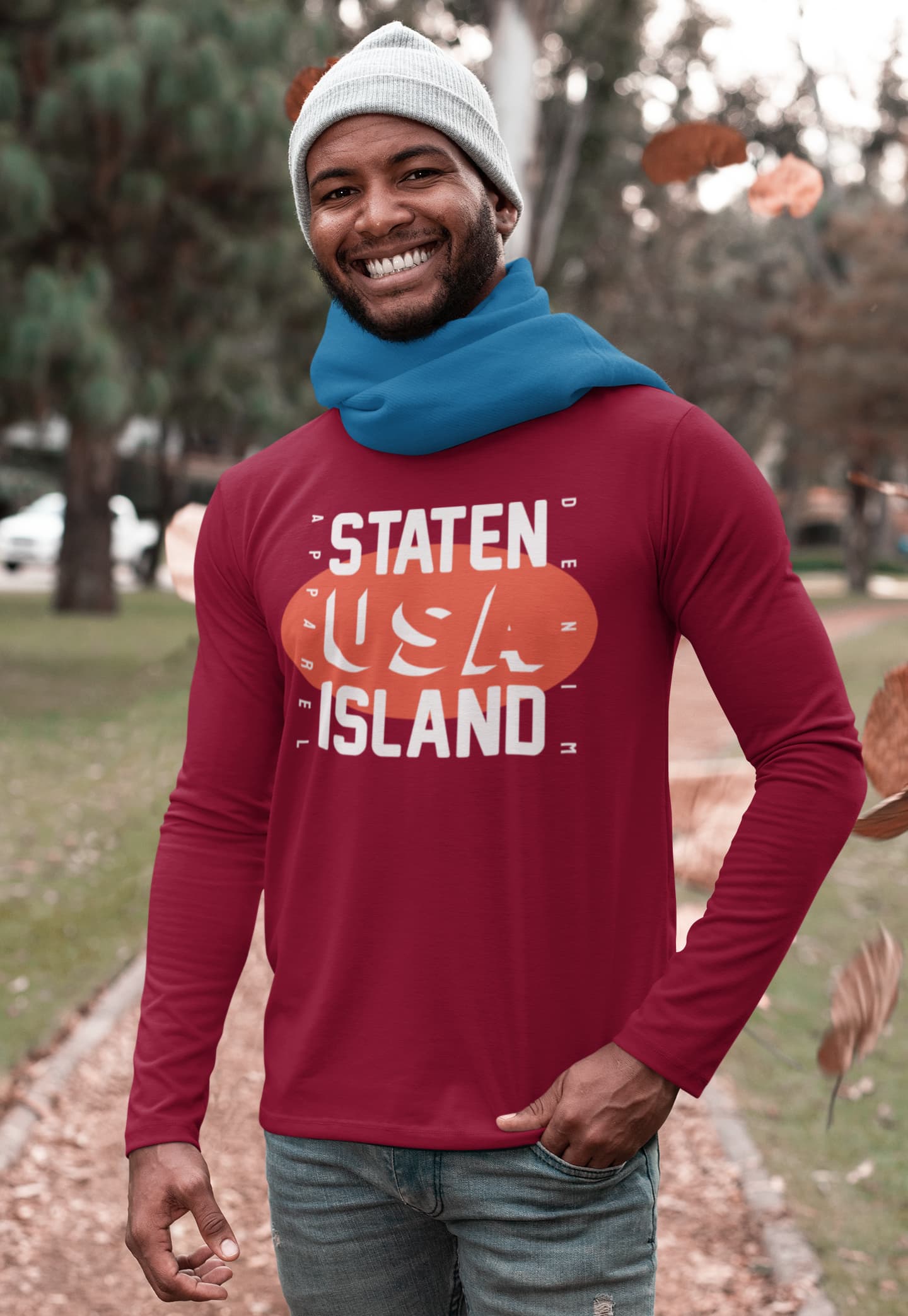 Man wearing a red long-sleeve shirt with &