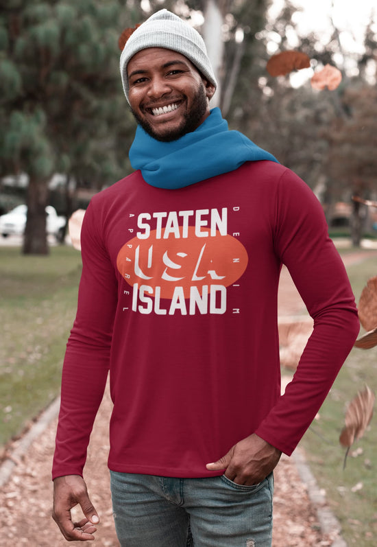 Man wearing a red long-sleeve shirt with &