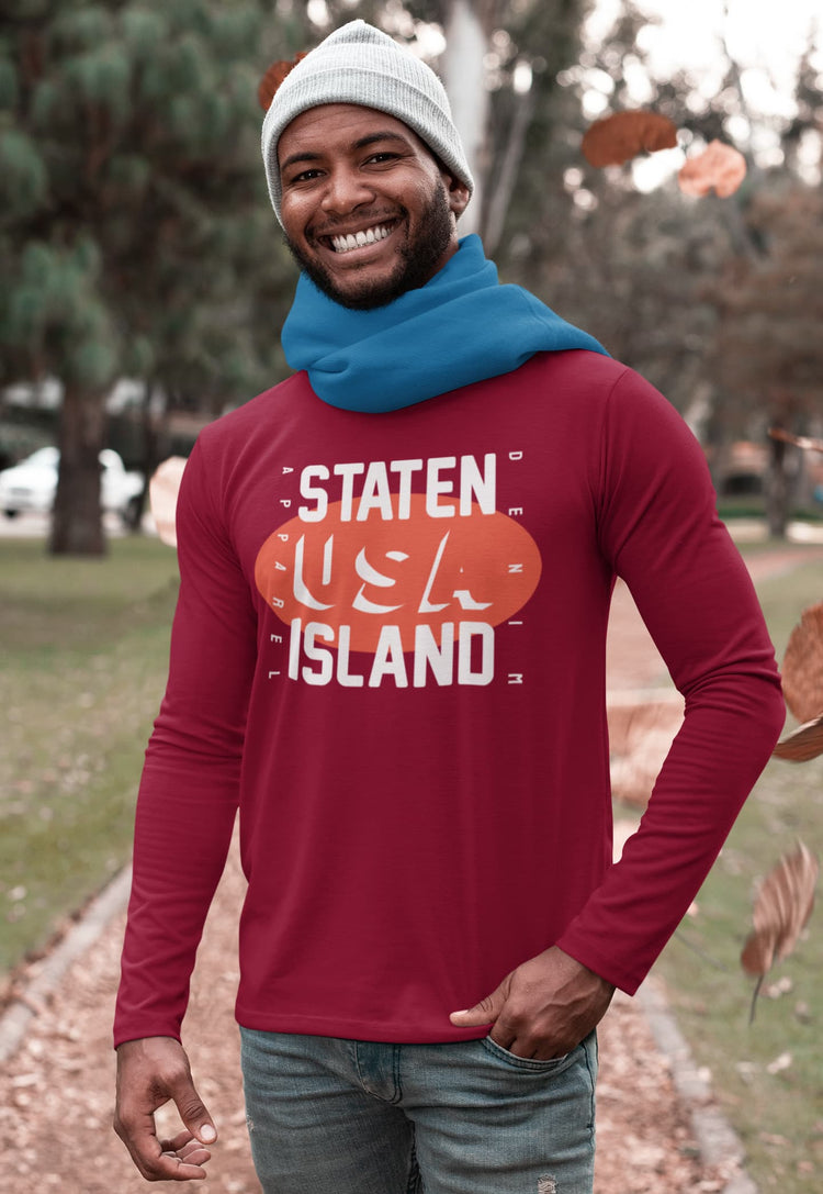 Man wearing a red long-sleeve shirt with &