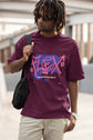 Man wearing a purple t-shirt with &