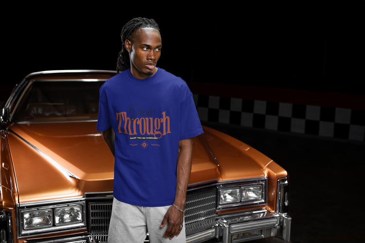Man wearing a blue t-shirt with &