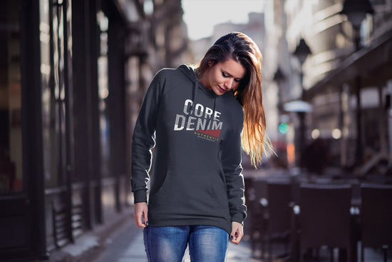 Woman wearing a hoodie with &