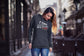 Woman wearing a hoodie with &