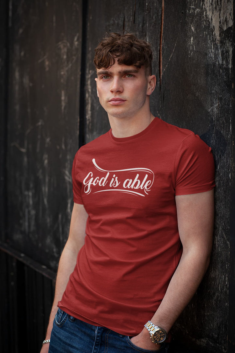 Man wearing a red t-shirt with &