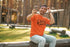 Man taking a selfie outdoors in a forested area