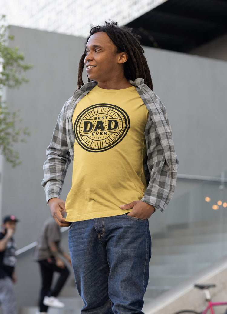 Man wearing a yellow t-shirt with &