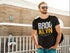 Man wearing a black t-shirt with &