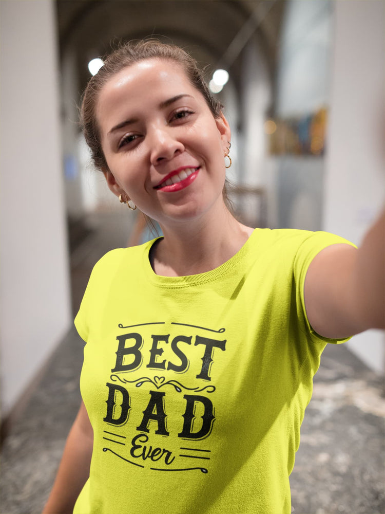 Woman wearing a bright yellow t-shirt with &
