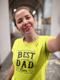 Woman wearing a bright yellow t-shirt with &