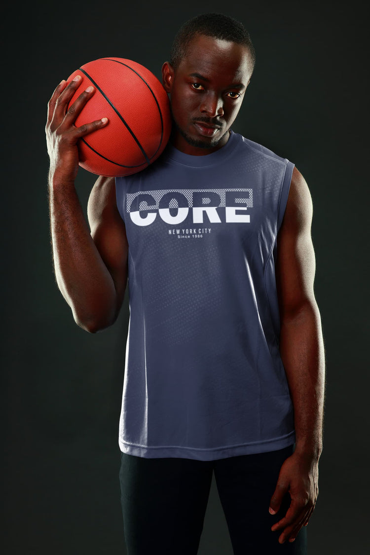 Man holding a basketball wearing a sleeveless shirt with &