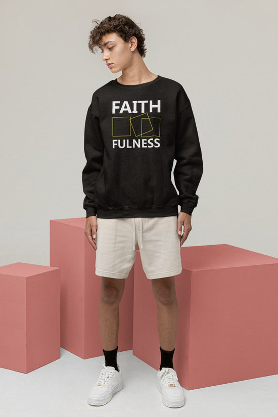 Person wearing a black sweatshirt with &