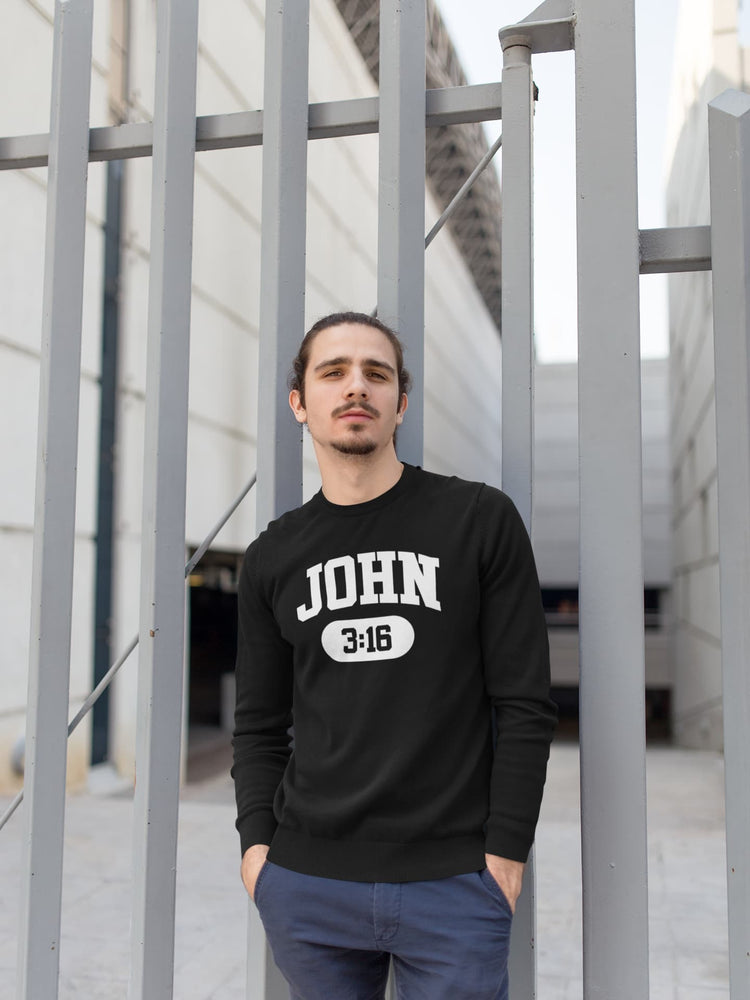 Man wearing a black sweatshirt with &